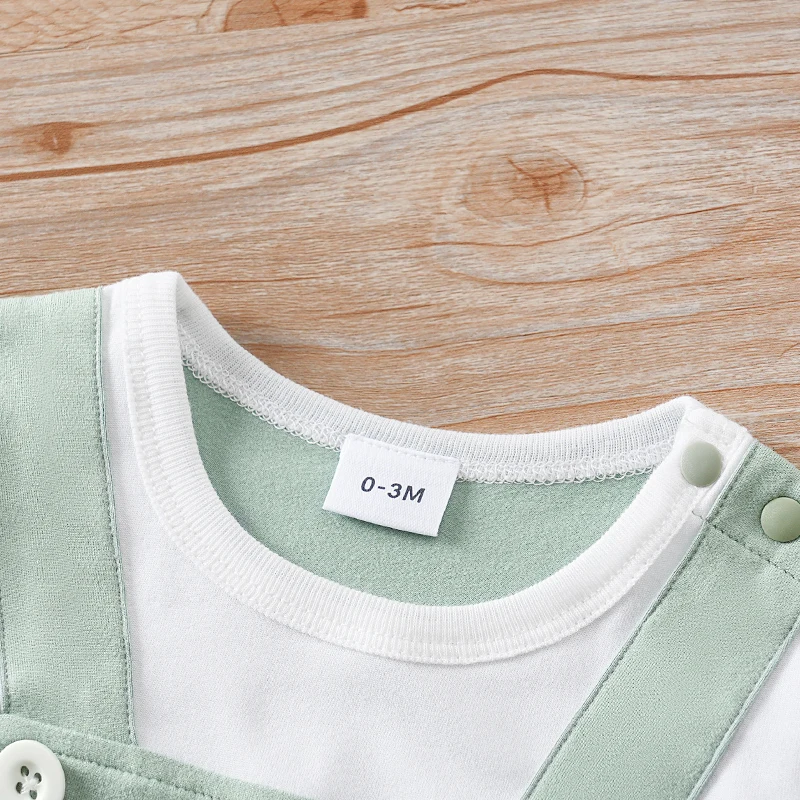 بدلة قفز للأطفال حديثي الولادة للعطلات الصيفية مكونة من قطعتين مطبوعة على شكل ديناصور لطيف وأكمام قصيرة ورقبة دائرية