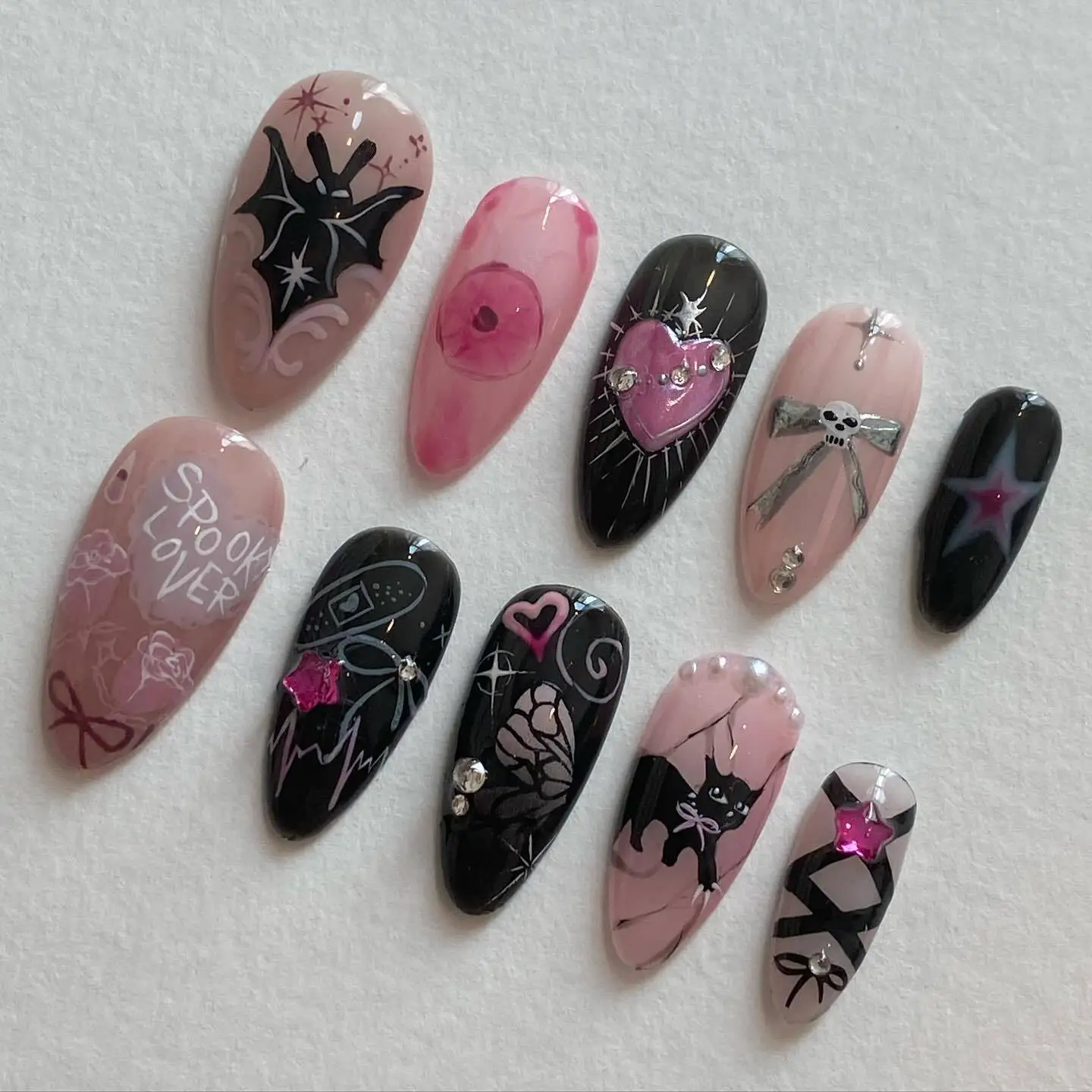 

24Pcs Mid-length Almond Press on Nails Tips with Bat Love Heart Bow Fake Nails Rhinestone Pearl Reusable Full Cover False Nails