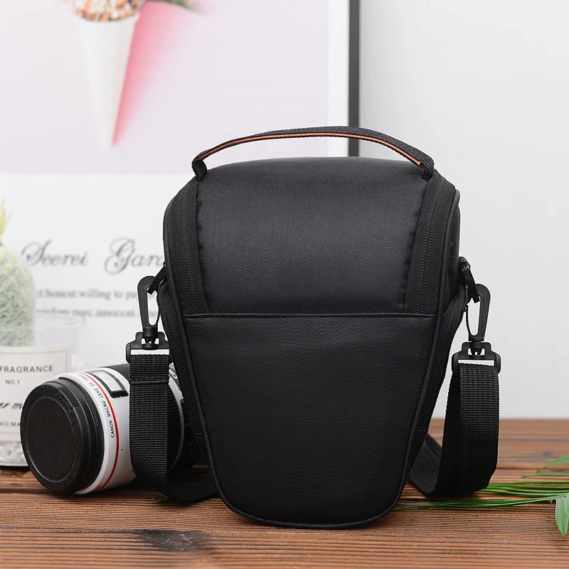 حقيبة كاميرا DSLR مثلثة سوداء مقاومة للماء حقيبة كاميرا كتف لكاميرات Canon Nikon Sony Micro Single DSLR معدات التصوير الفوتوغرافي