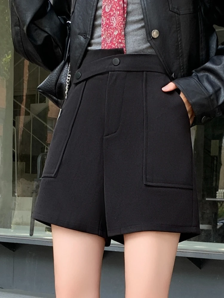 Shorts de perna larga de lã irregular para mulheres no outono e inverno 2025 novo bolso de cintura alta emagrecimento calças curtas linha A