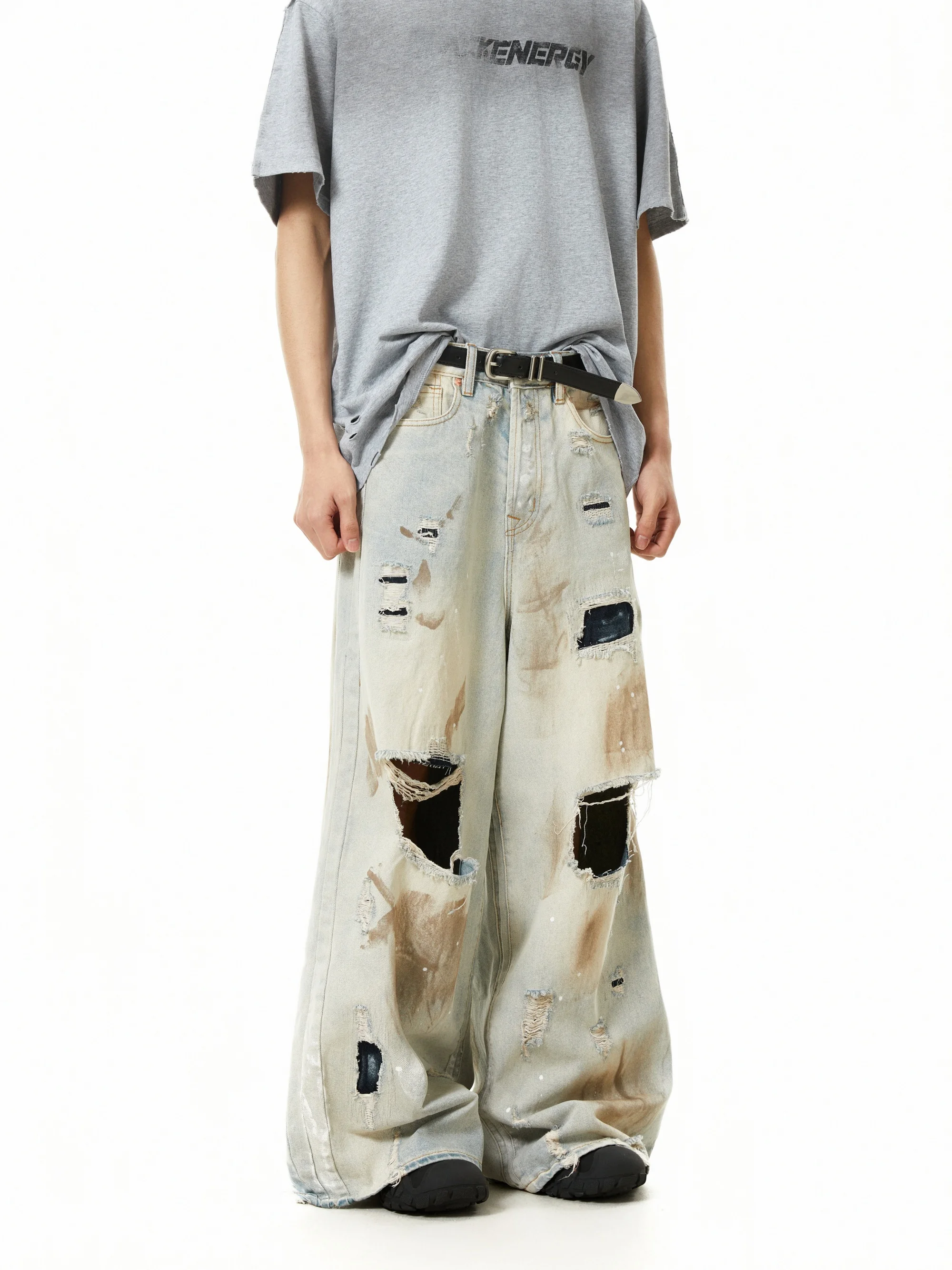 Niche Design moddergeverfde jeans met grote schade en wijde pijpen Amerikaanse retro gewassen dweilbroek