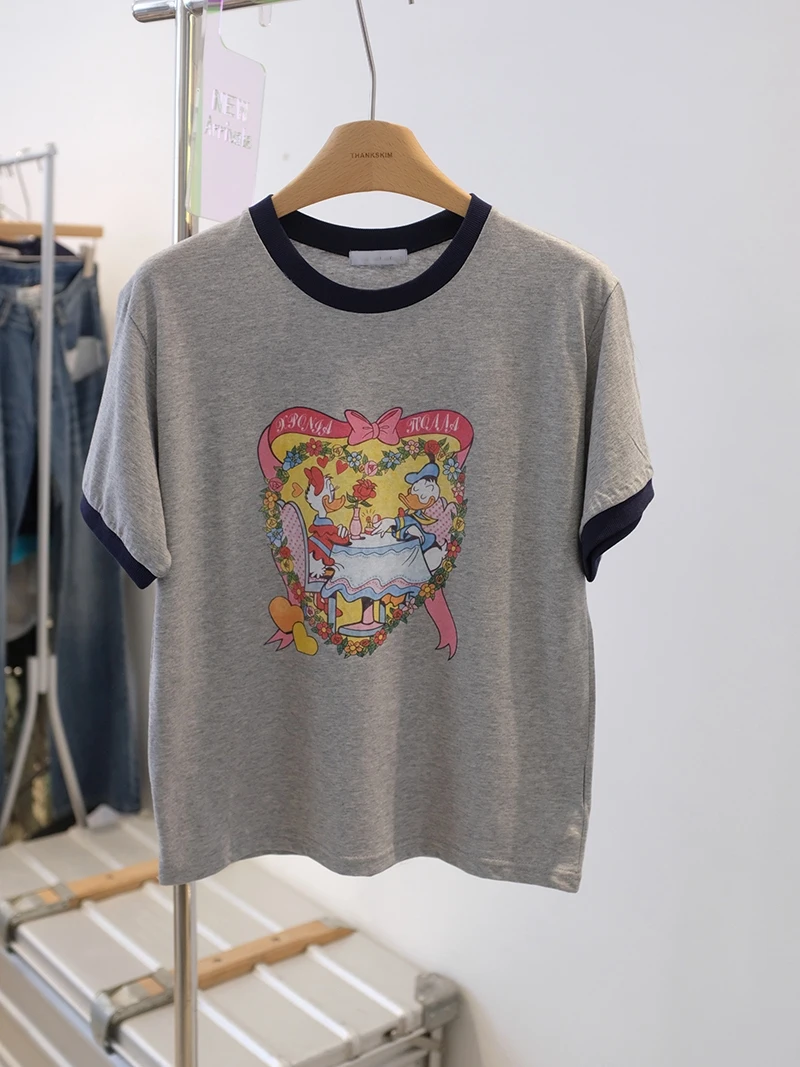

Loose round Ne ort Sve T-irt Women's Dongda Gate New Sle Patchwork Cartoon Du Print Korean Sle Cotton Summer Top