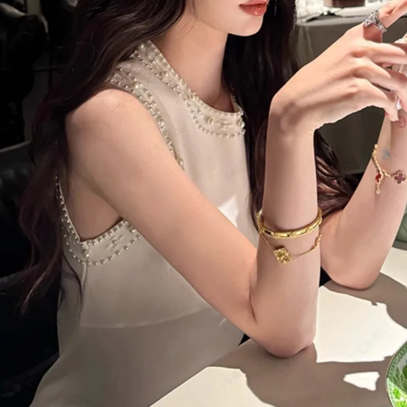 

2025 Early Spring Sleeveless Knitted Dress Women New Fashion Pearls Elegant Round Neck long Dresses