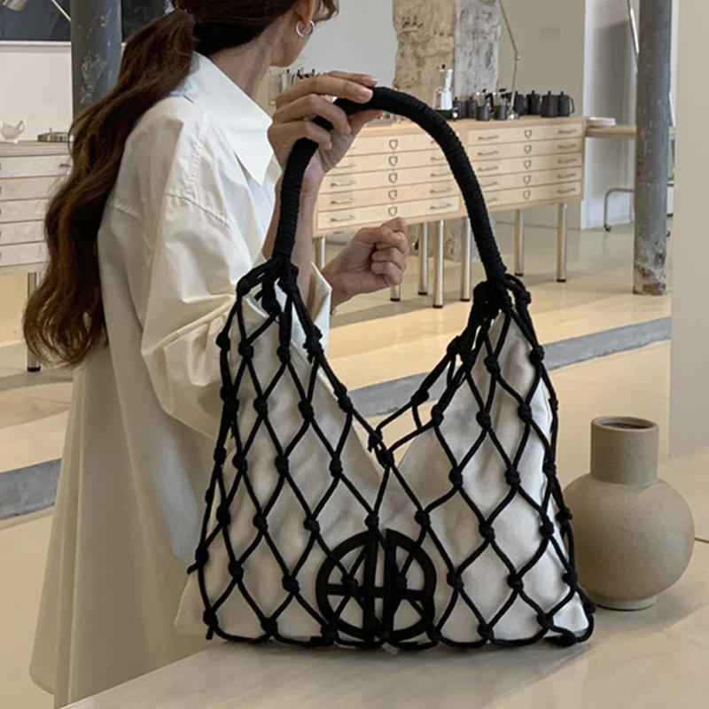 Sacs de plage minces creux pour femmes Sacs à main et sacs à main de créateurs de luxe 2024 Nouveau en corde de nylon Toile tressée Poche intérieure Tissée Poignée supérieure Sac à bandoulière sous les bras haute quali