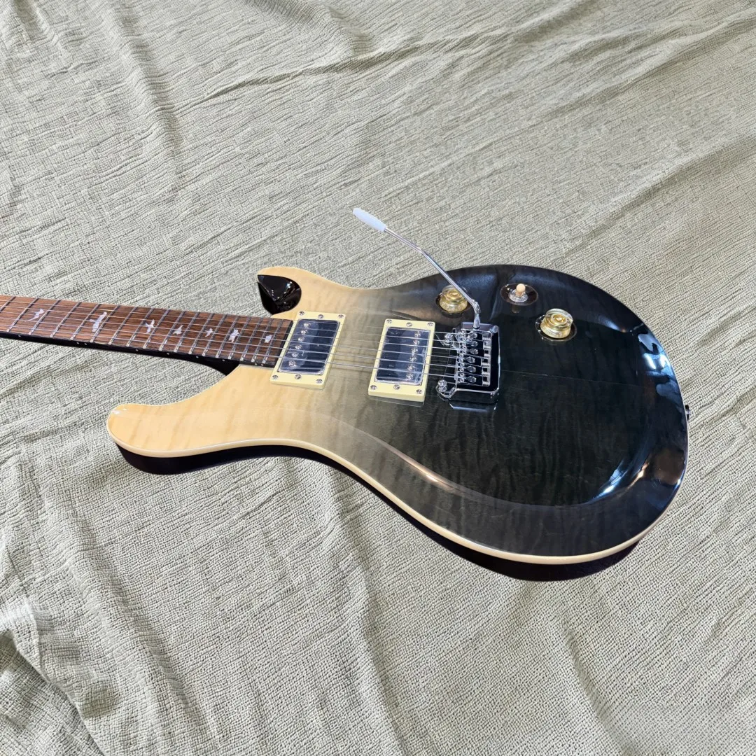 6 String Solid Body Electric Guitar, Black to Natural Gradient Quilted Top, Dual Humbuckers, Tremolo Bridge, Gold Control Knobs