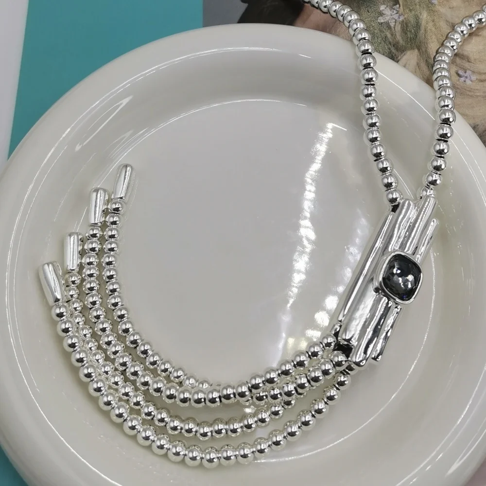 Light luxury multi chain necklace with black crystal accents, niche design, fashionable dressing