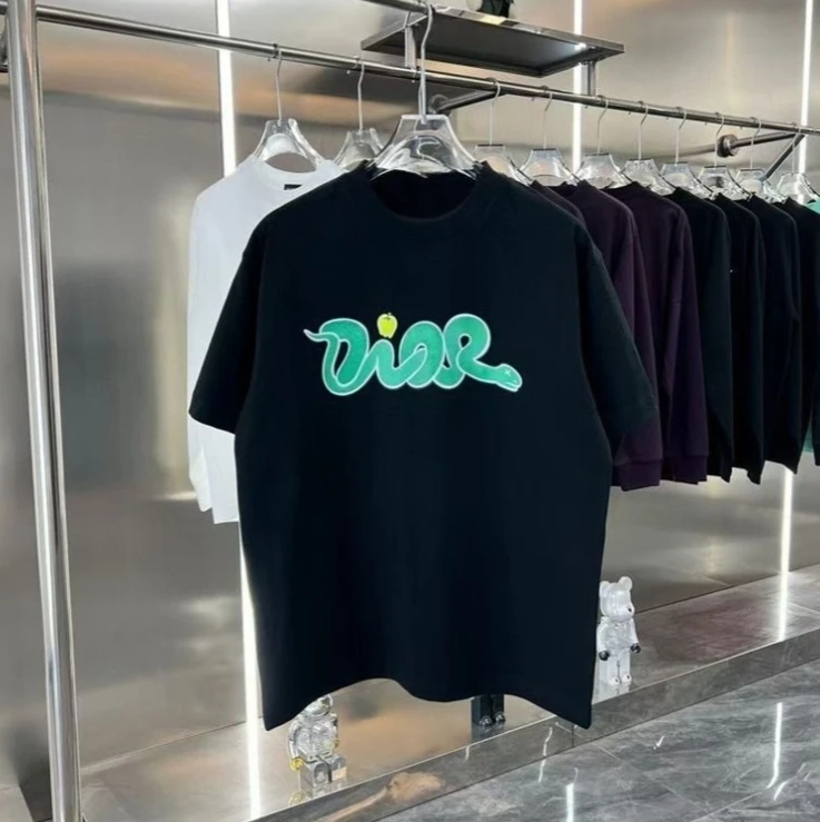 

Весна/Лето 2026, новый стиль, модная повседневная свободная хлопковая футболка со змеиным животным и буквенным принтом для женщин