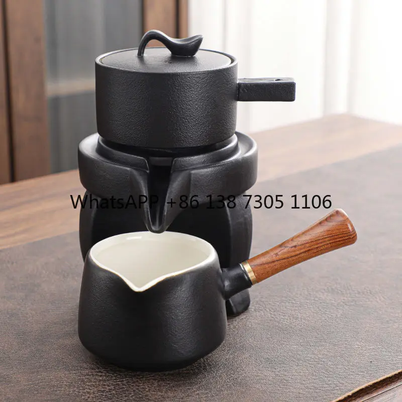 

Black pottery lazy stone grinding automatic tea set rotating water outlet anti-scalding teapot office meeting guest tea brewer