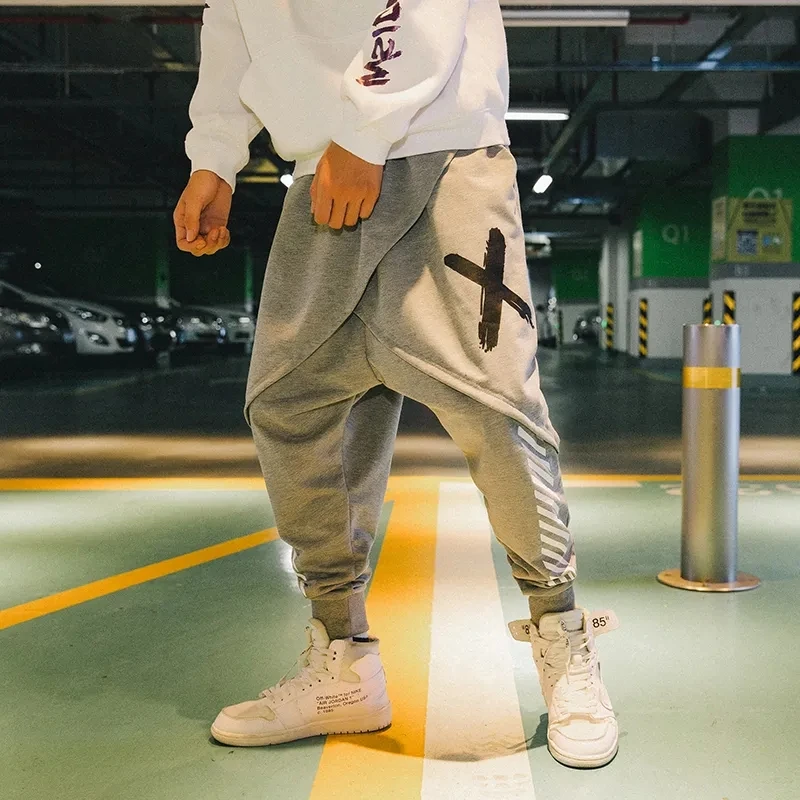 

Men Clothing Hip-Hop Pants Haren Pants Loose Casual Pants Male Bunches Foot Pants Fake Two Pieces Pantalones Hombre Streetwear