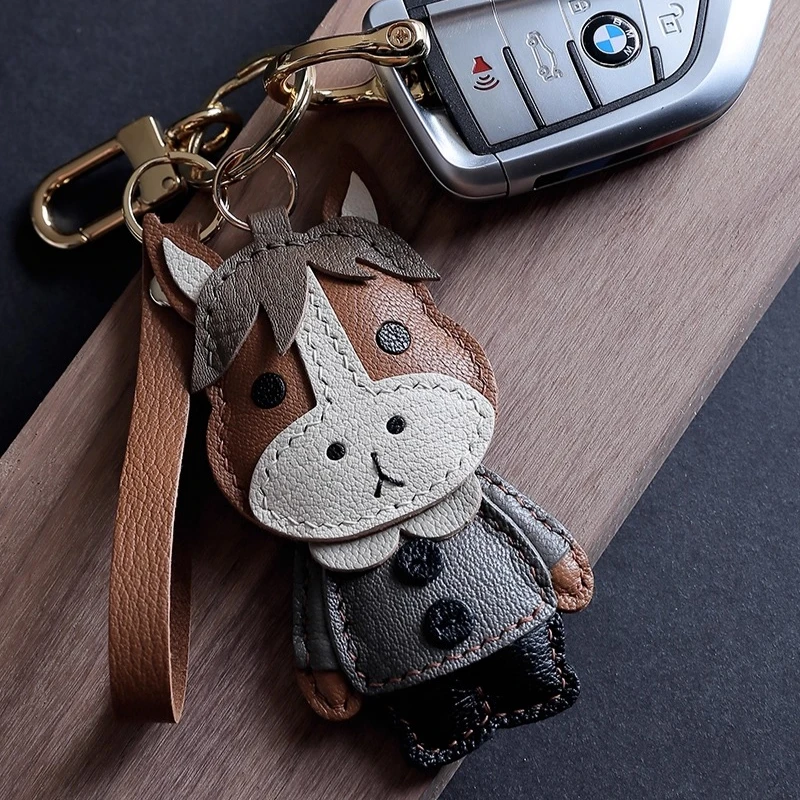 

Подвеска в виде фигурки лошади, подвеска в виде сумки из французской овчины, подвеска для телефона, брелок из натуральной кожи ручной работы.