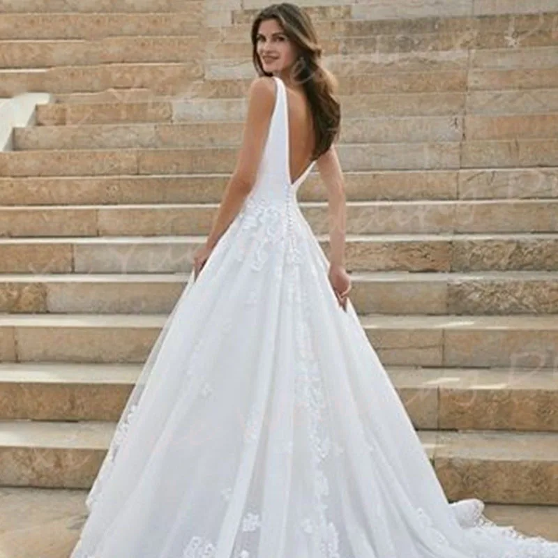 Vestidos De novia elegantes con escote en V profundo, vestidos De novia con apliques De encaje, sin mangas, Espalda descubierta, tul moderno