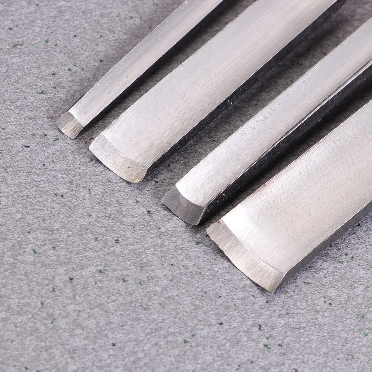 

4Pcs Wood Carving Chisel Tool Set Sharpened Steel Handles Ergonomic Grip for Woodworkers Carvers Artists Woodworking Accessories