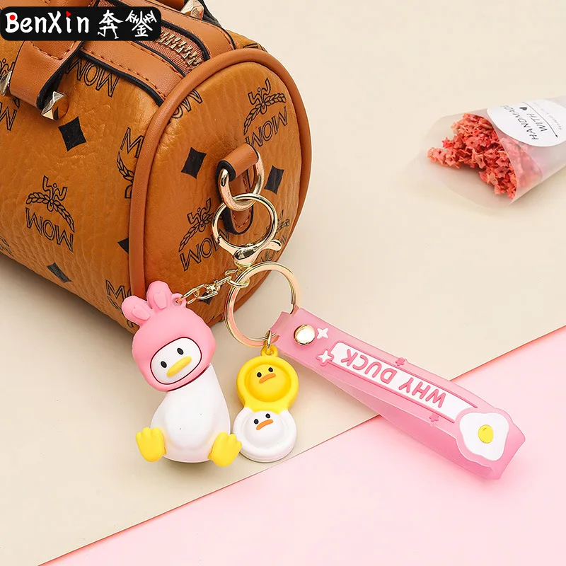2025 Minso Exquisite and creative tilting duck keychains, car couple bags, key chains, pendants, high-end small gifts