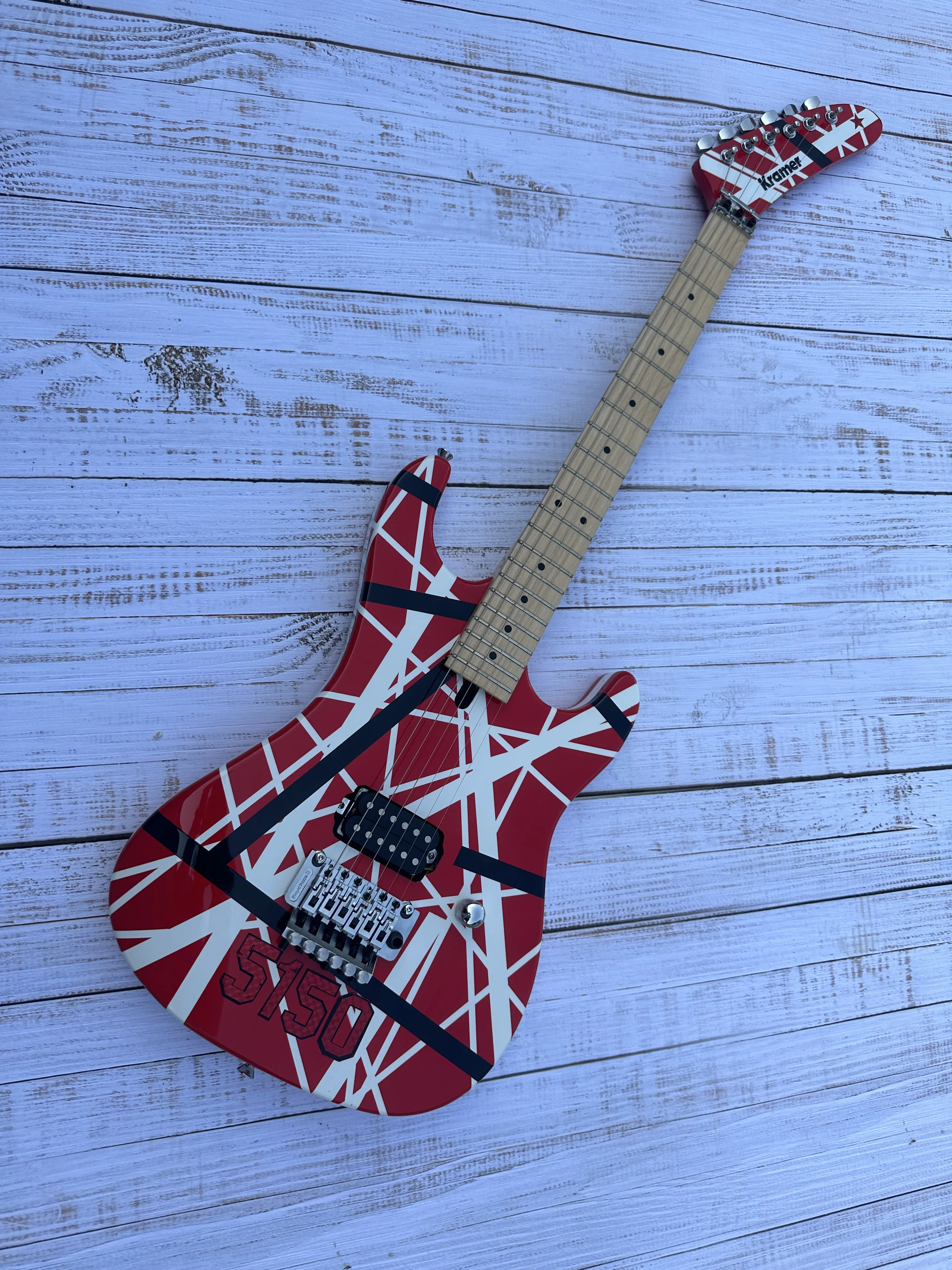 

5150 electric guitar, imported alder body, Canadian maple fingerboard, signed, classic red and white stripes, lightning package