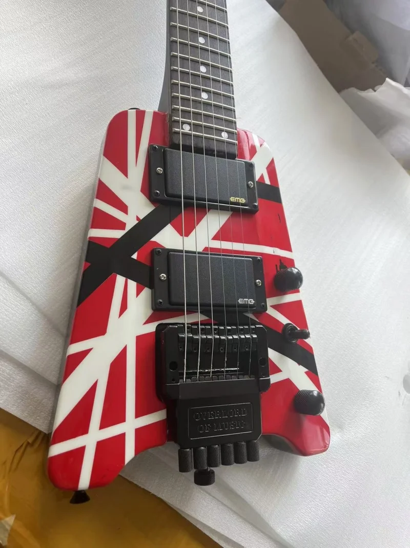 

Высококачественные 6-струнные электрогитары без головы, черно-белые наклейки на корпус, гибкий бридж, активный звукосниматель, бесплатная доставка