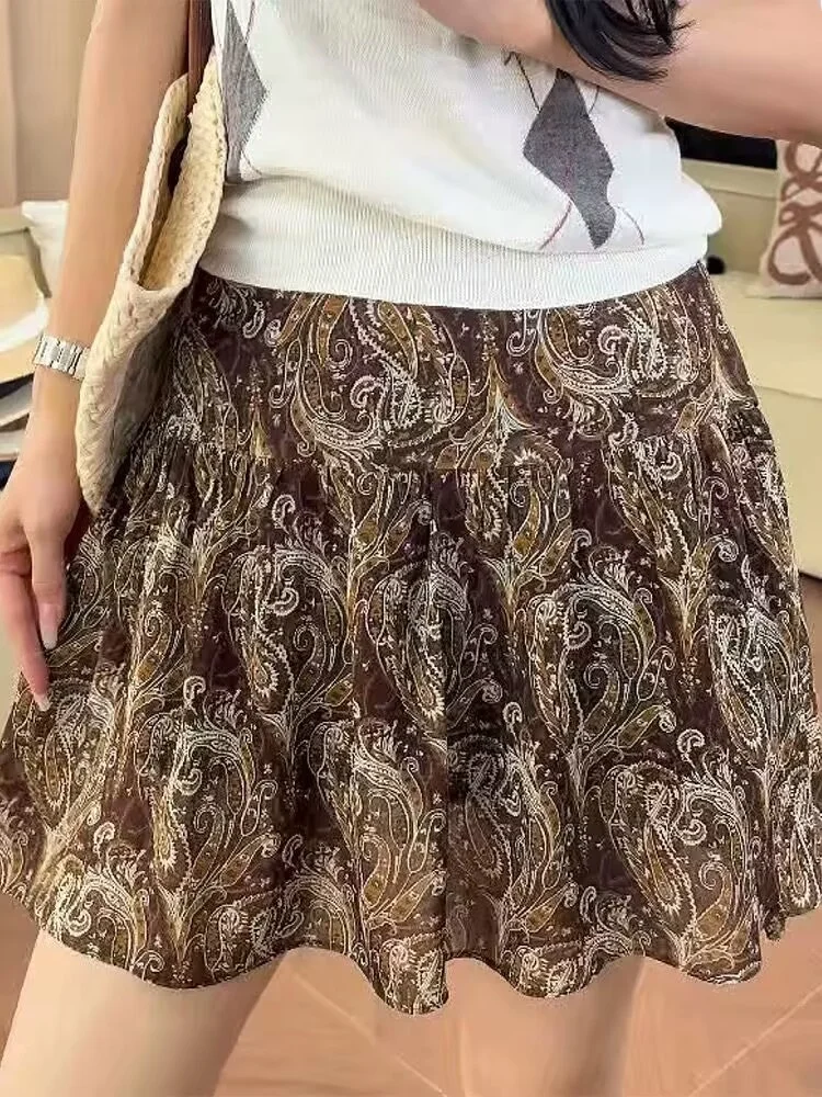 Retro Floral Print Half Skirt Women's Summer 2026 Fashion Holiday Travel Short Skirt A-Line Loose High Waist Floral Pattern