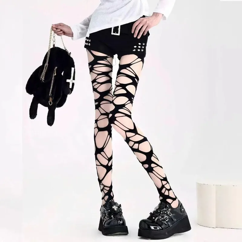 A pair of homemade gothic punk style stockings hot girl subculture black hole stockings bottoming pantyhose