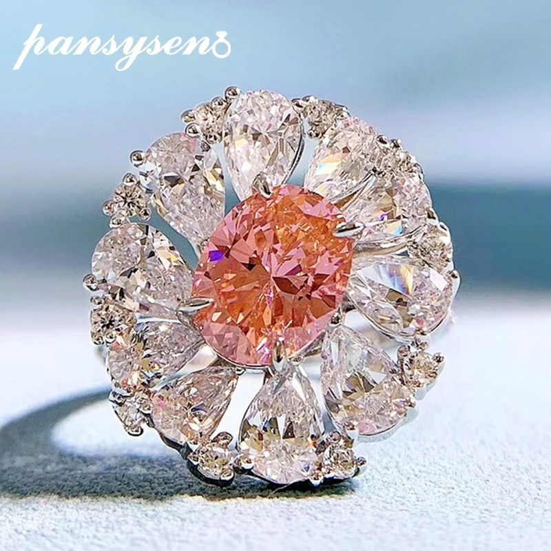 

PANSYSEN Trendy 925 Sterling Silver Oval Cut Pink Orange High Carbon Diamond Gemstone Ring 18K White Gold Plated Fine Jewelry