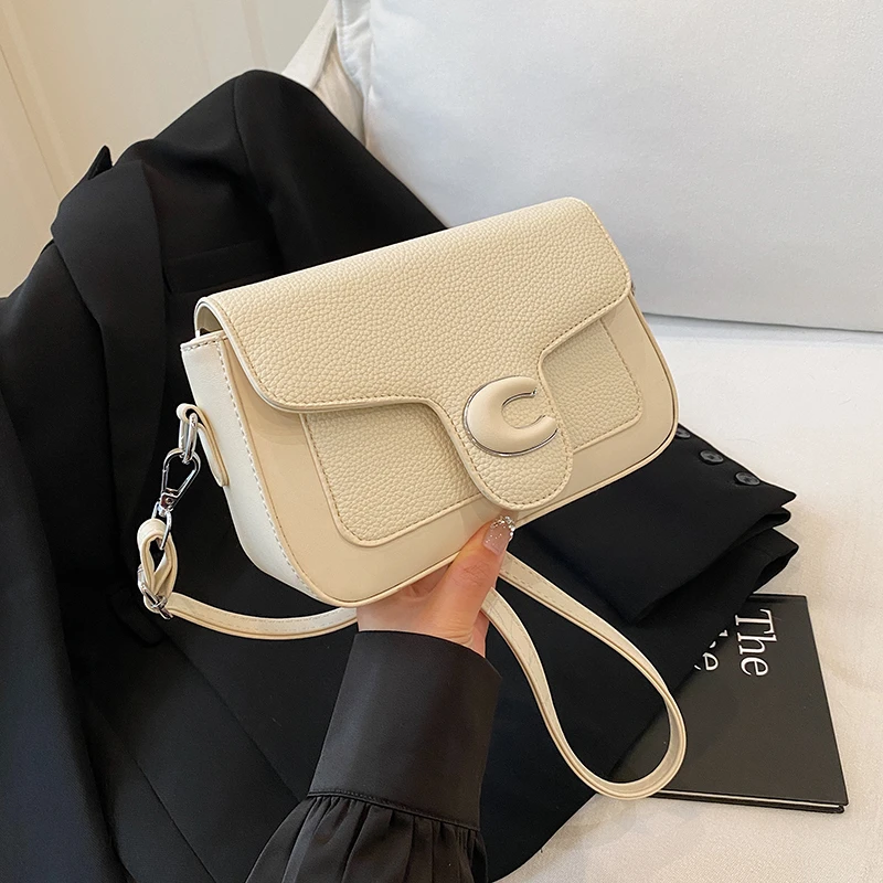 

Дизайнерская минималистичная сумка для подгузников класса люкс: элегантная женская сумка через плечо с винтажным дизайном и большой вместимостью, сумка-мессенджер.