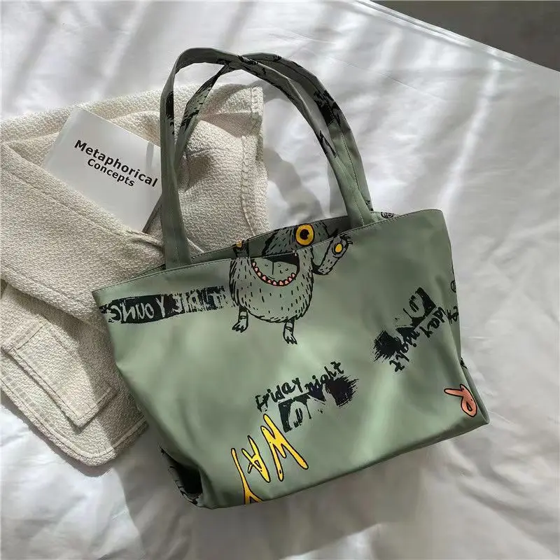 Bolsos de mano versátiles de gran capacidad para mujer, bolsos de hombro que combinan con todo, monstruo de Halloween, dibujos animados, estudiantes, otoño e invierno, 2021