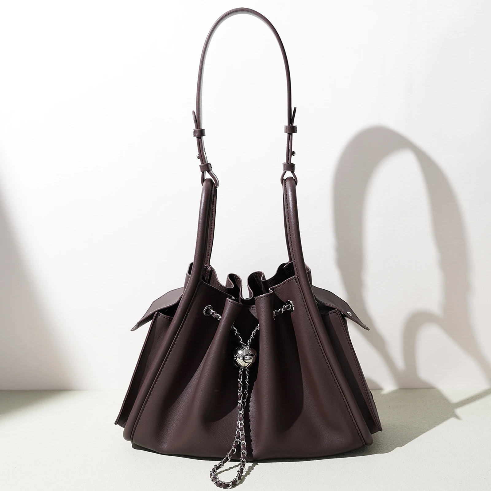 Women 2026 New Genuine Leather Casual Slouchy Bucket Bag Chain Drawstring Shoulder Bag Niche Unique Crossbody Handheld Purse