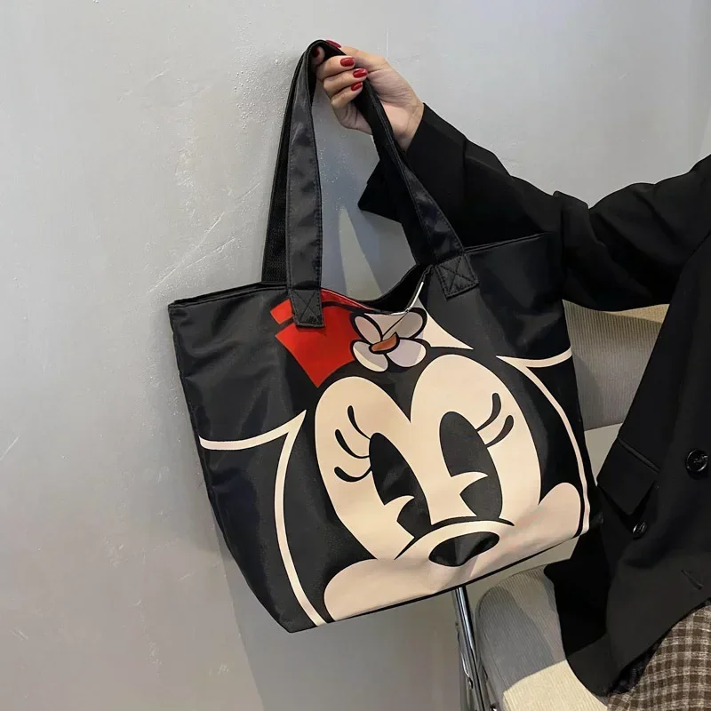 

Disney Mickey Mouse Large Capacity Tote Bag Women's 2024 New Fashion Oxford handbag Cartoon Shoulder Large Shopping Bag