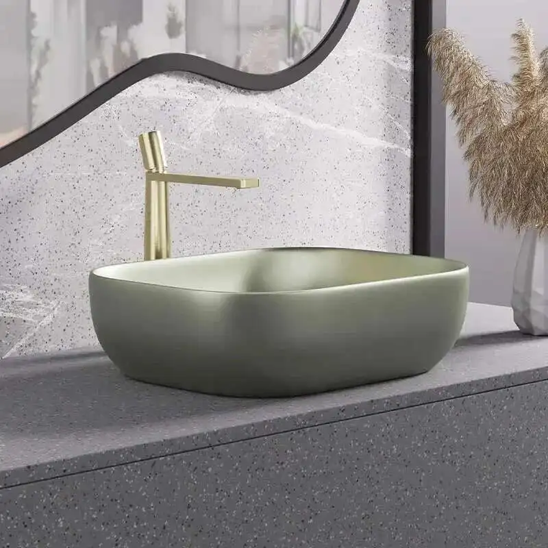 

Simple Ceramic Sinks for Toilets Nordic High-end Deep Above-the-counter Basin Luxury Oval Designer Bathroom Sink for Balcony