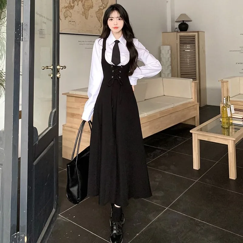 Japanese College Wind Waist Slim Strap Dress Female INS Personality Fashion Niche Design Sense Joker gonna lunga allentata con bretelle