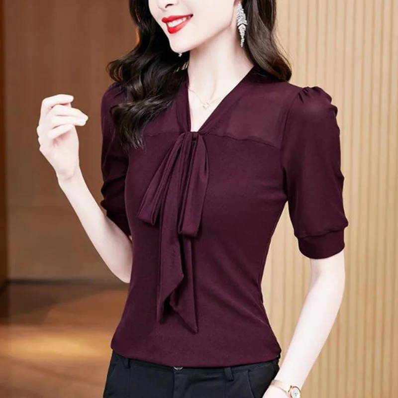 Elegant V-Neck Spliced Loose Folds Lace Up Bow Blouse Women\'s Clothing 2023 Summer New Casual Pullovers Tops Office Lady Shirt