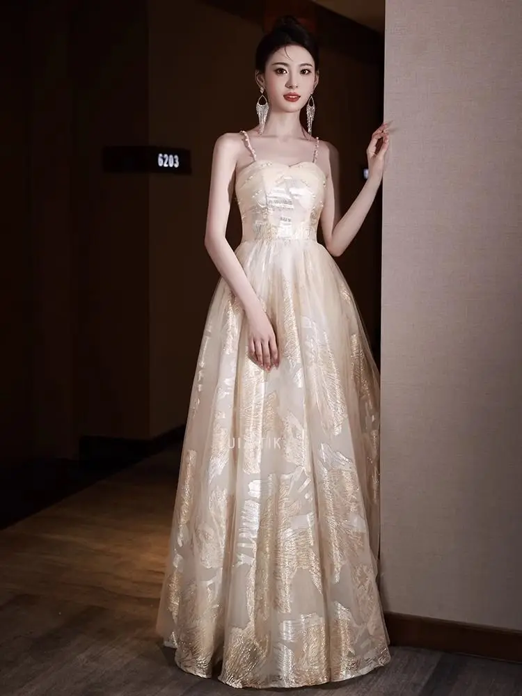 ชุดราตรีแบบไม่มีสายคาดไหล่ แชมเปญ ประดับลายปักดอกไม้สุดหรู ชุดงานเลี้ยงค็อกเทล ผ้าทูลล์คลาสสิก ทรงเอไลน์ยาว ชุดออกงานทางการ