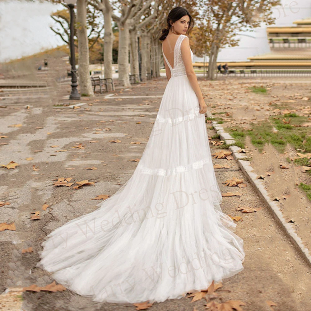 Boho affascinante scollo A V una linea abiti da sposa Sexy grazioso senza maniche Backless Tulle abiti da sposa Vestidos De Fiesta Elegantes