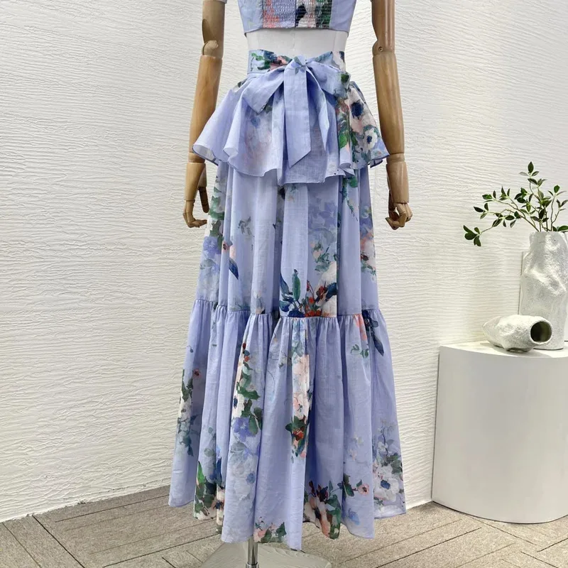 Nueva colección de verano Vestido midi plisado con cintura trasera sin mangas con estampado floral azul para vacaciones