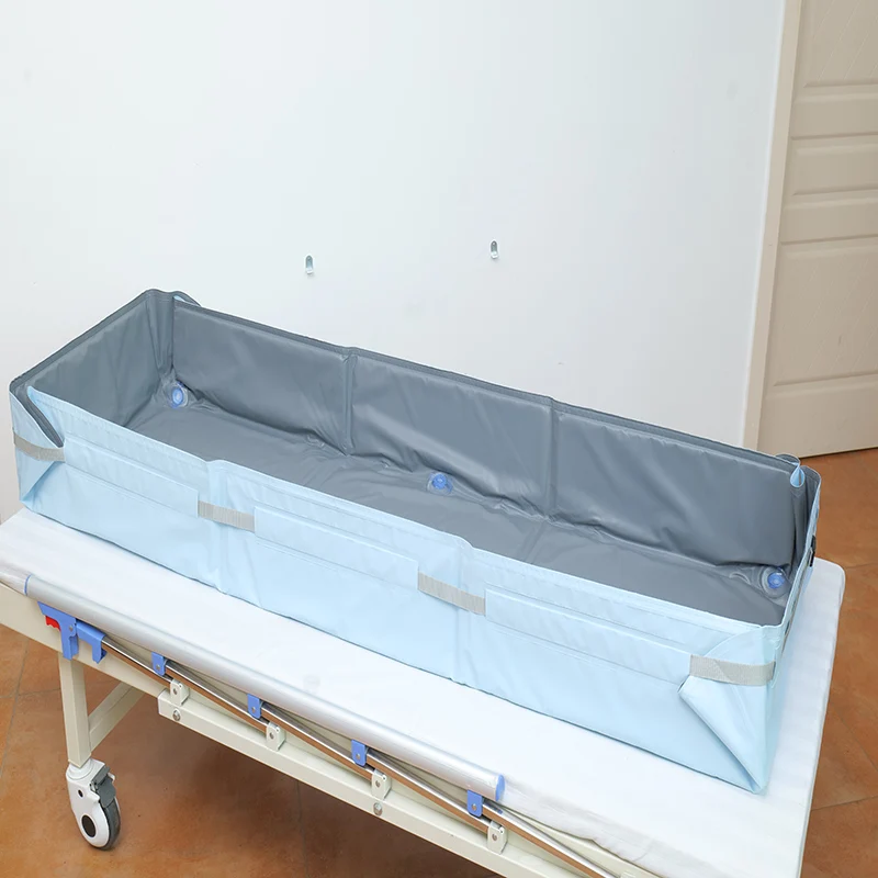 The portable bathtub allows for a safe and comfortable full-body bath without the need to transfer to the bed