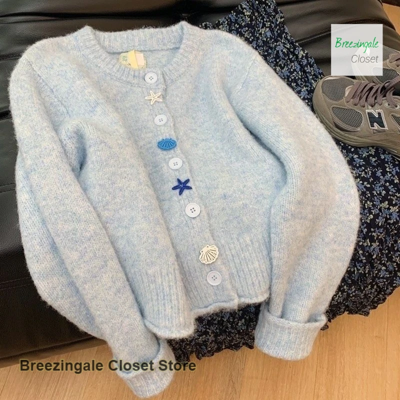 

French style fashion milk blue gentle wind knit cardigan women's spring and autumn new temperament high sense casual sweater