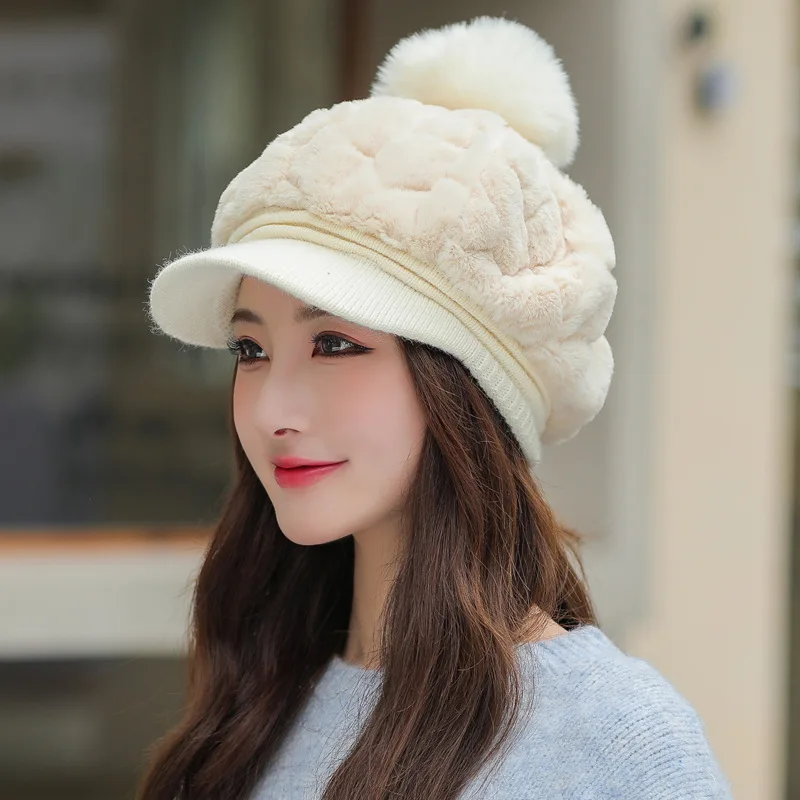 Autumn and winter new women\'s hats fashion wild plush warm duck tongue hat cute hairball cold protective ear cap