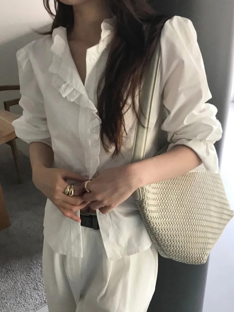 Irt blanco elegante para mujer primavera 2026 dulce Simple empalme diseño de encaje coreano Sle suelto ajuste largo Sve adorno Floral