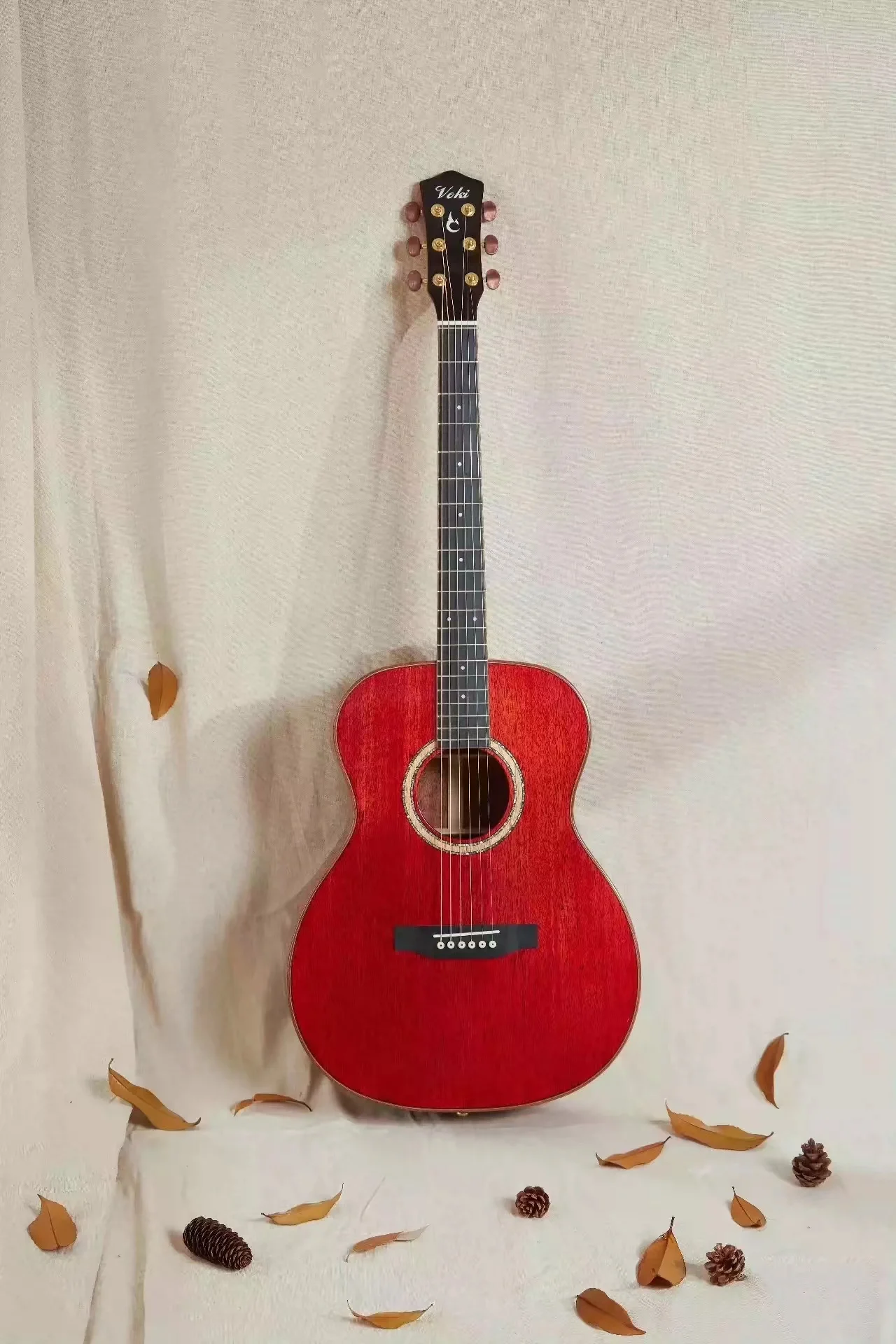 

VOKI Warm Sun solid wood section folk acoustic guitar refers to low string pitch