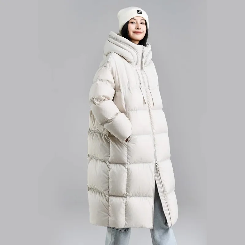 Piumino lungo a sbuffo per donna Inverno 2025 Nuovo cappotto con cappuccio addensato resistente al freddo allentato Cappotto Parka caldo con cappuccio femminile