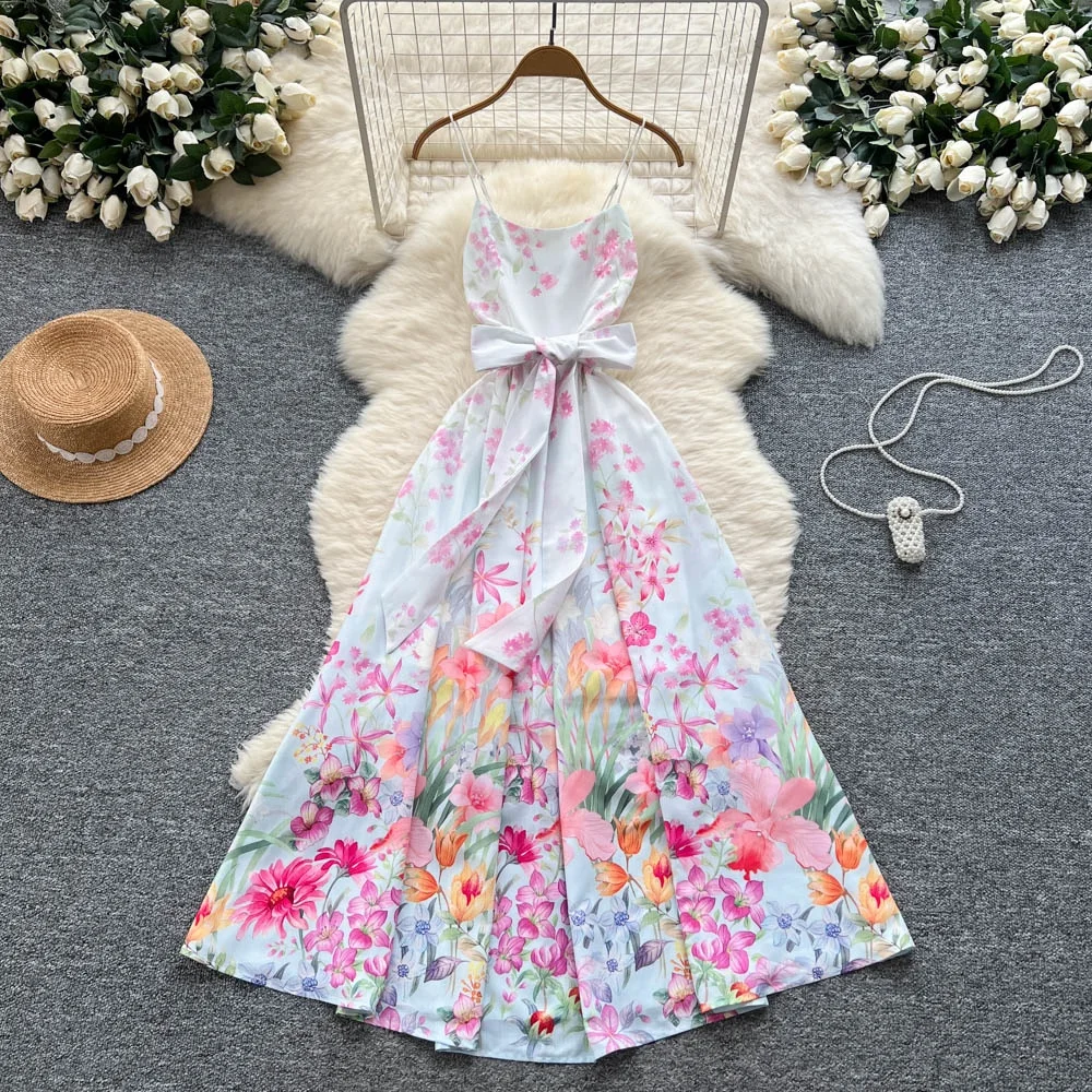 Clothlandผู้หญิงElegant Floralพิมพ์Camiชุดสปาเก็ตตี้สายรัดBackless Sashes Retro MidiชุดMujer QE127