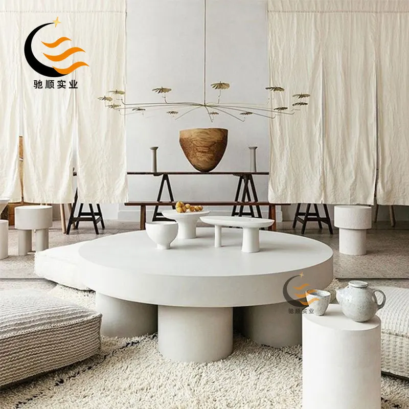 

Italian light luxury fiberglass round coffee table modern simple small apartment model room creative beauty decoration edge