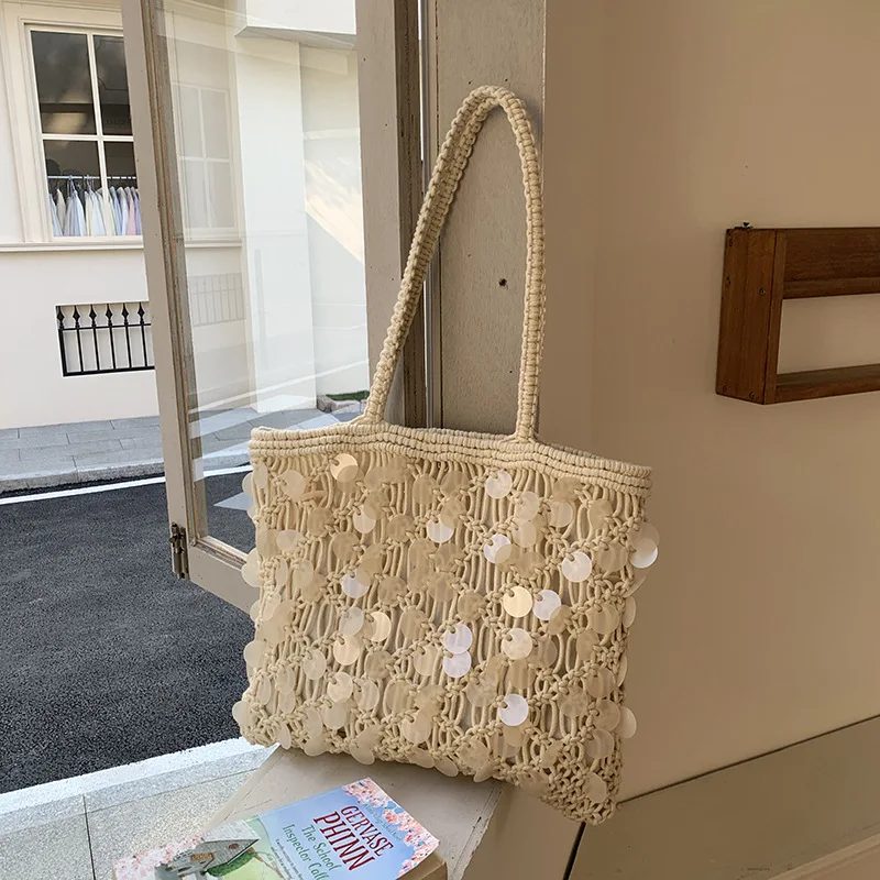 Niche light luxury spring and summer shoulder woven bags, large-capacity women's bags, hollowed-out hand-crocheted bags