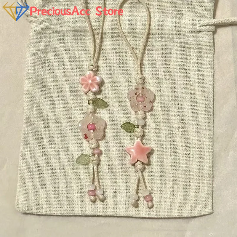 Bonita correa para teléfono móvil con forma de estrella y flor, cordón para teléfono móvil con cuentas de cerámica Kawaii, decoración para bolso, colgante para cámara, llavero de moda