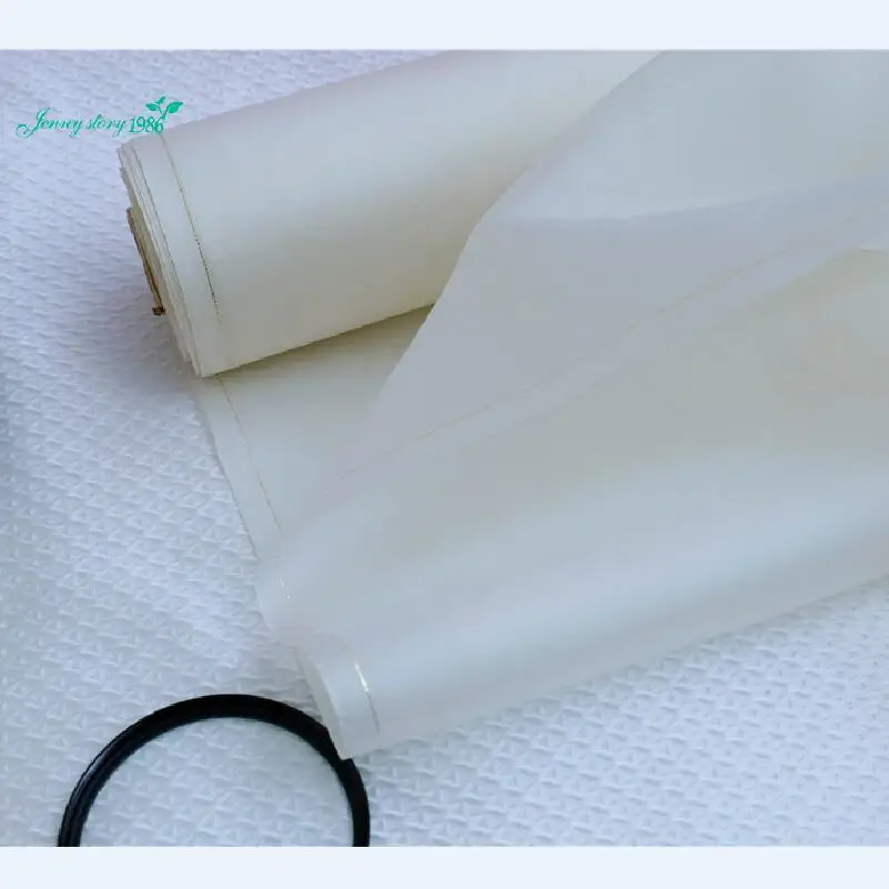 100% mulberry silk Organza fabric is 14 mm thick and white. Coarse grain. And fine grain wedding dress shop raw materials