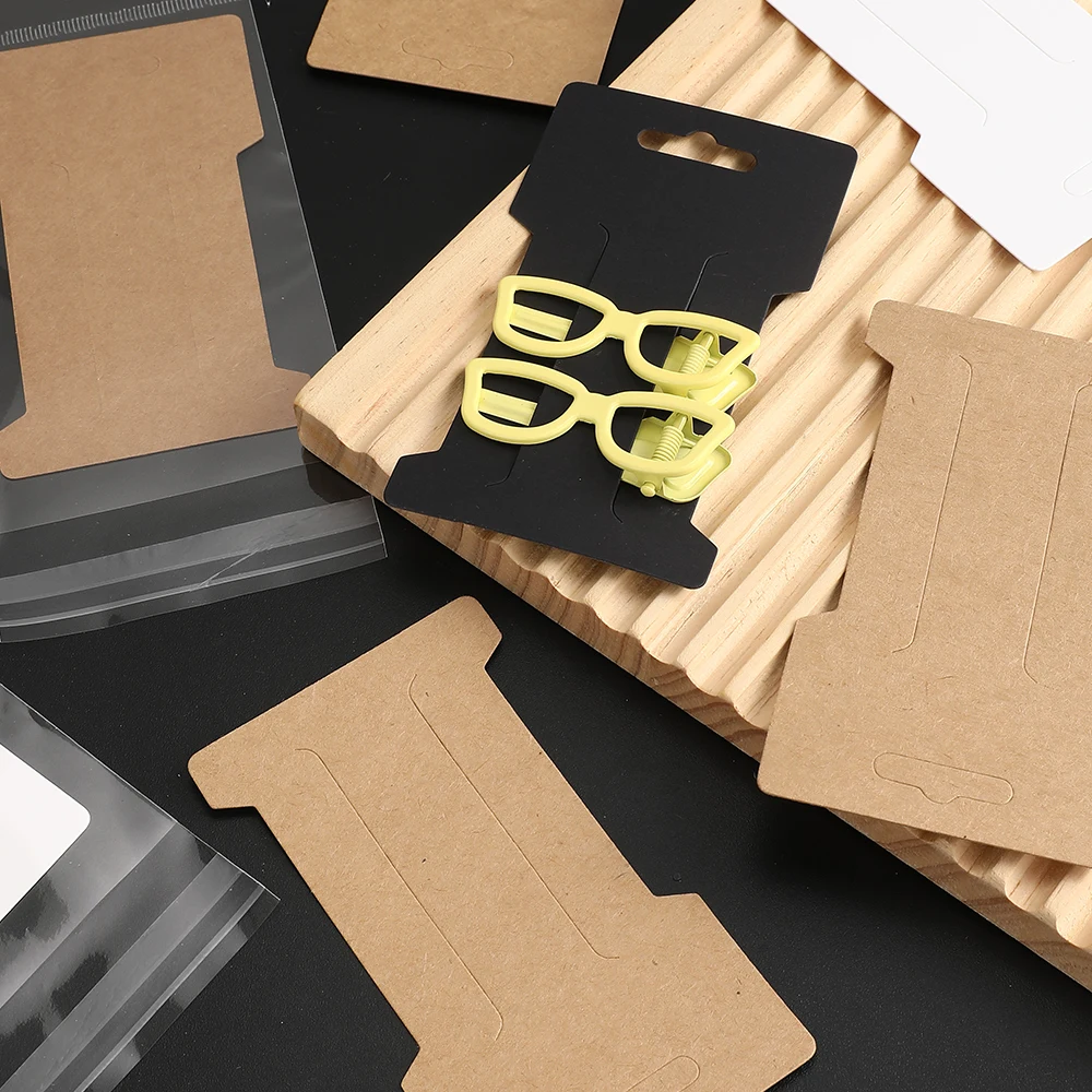 50 Stück T-förmige Haarspangen-Displaykarten aus Papier und 50 Stück transparente OPP-Selbstklebebeutel für die Präsentationsverpackung von Haaraccessoires. – Detail 1
