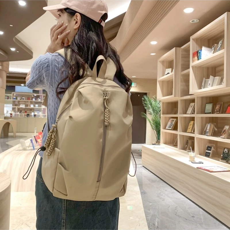 

2025 New Men's High-End Large-capacity Simple Schoolbag Female College Student Travel Backpack Solid Color Casual