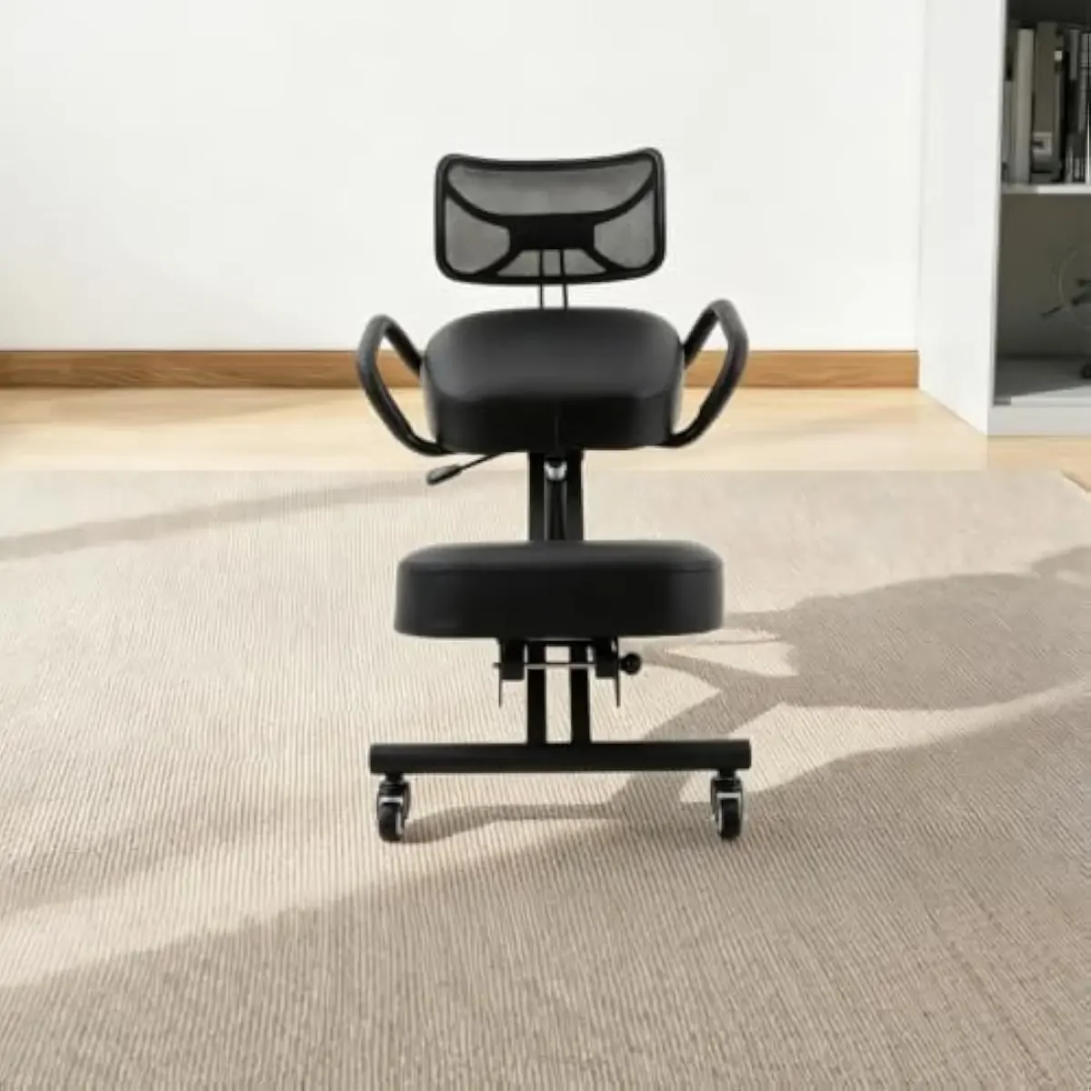 Ergonomic kneeling posture chair with breathable mesh backrest, height-adjustable steel frame, padded knee cushion, 360-degree s