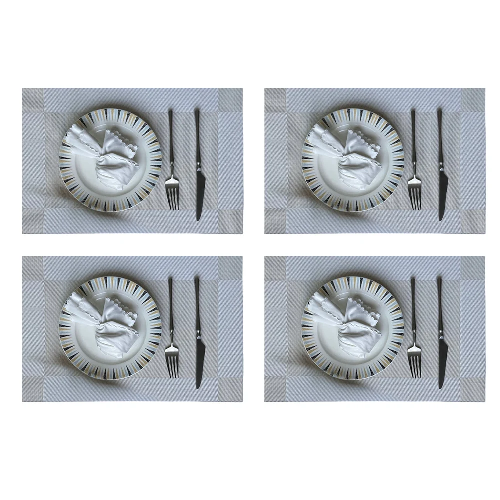 Set of four placemats offering protection against heat and spills for use in dining areas kitchens and restaurants