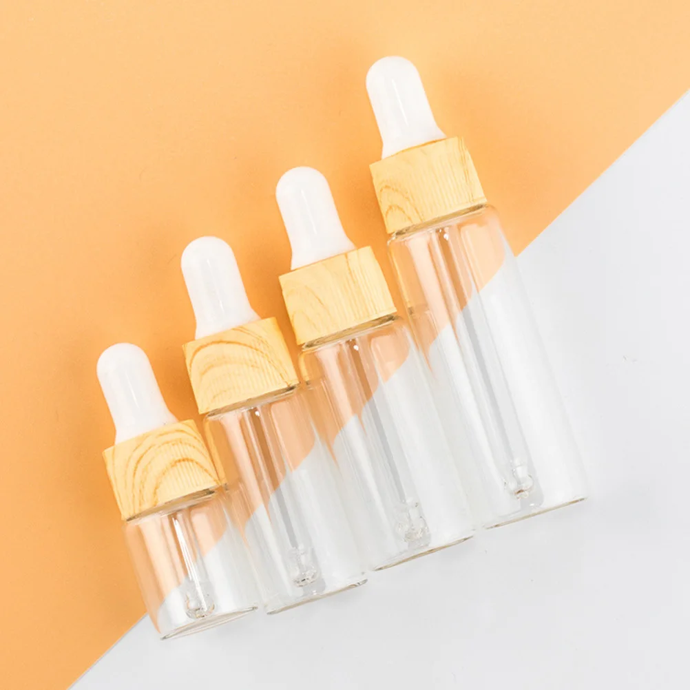 

4Pcs Wood Grain Glass Dropper Dispenser Bottles Durable Essential Oil Empty Containers 15ml Transparent Body Silicone