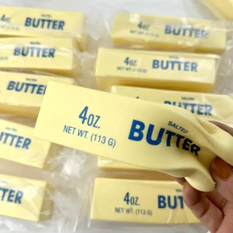 Auf Lager: Weicher, langsam aufsteigender Butter-Stick mit Duft – Squishy-Spielzeug mit nassem Handgefühl, Stressabbau-Quetschspielzeug, Handentspannung, Überraschungsgeschenk
