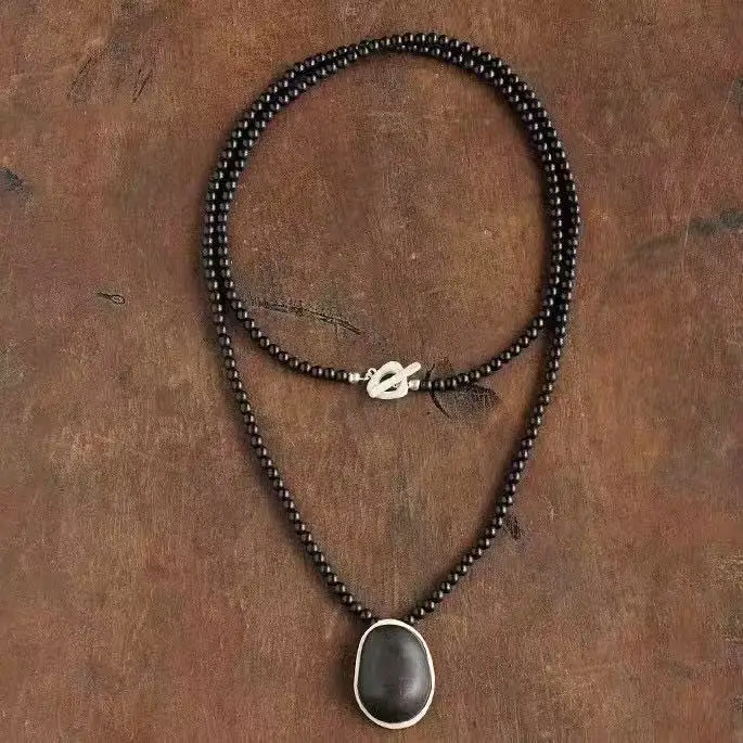 

Contour ebony long necklace, niche design high-end handmade beaded texture sweater chain for women